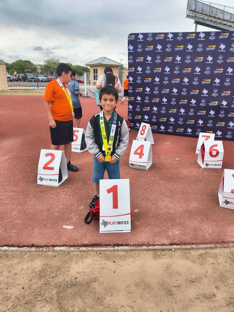 boy green shirt and first place