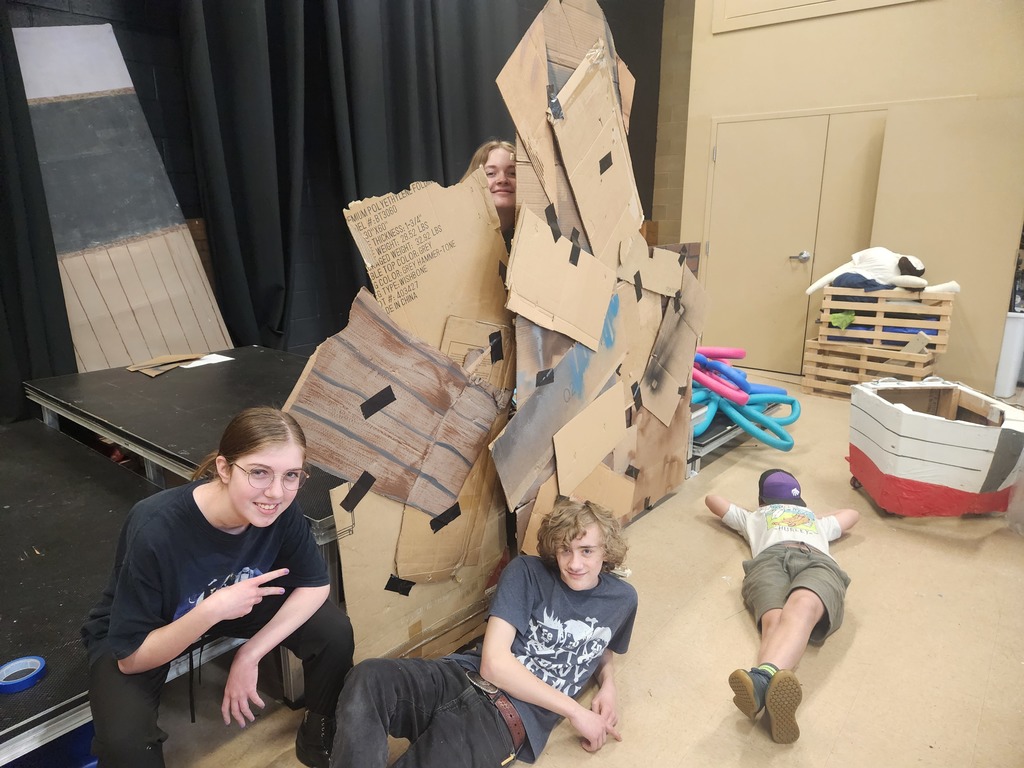 Tech crew working on props