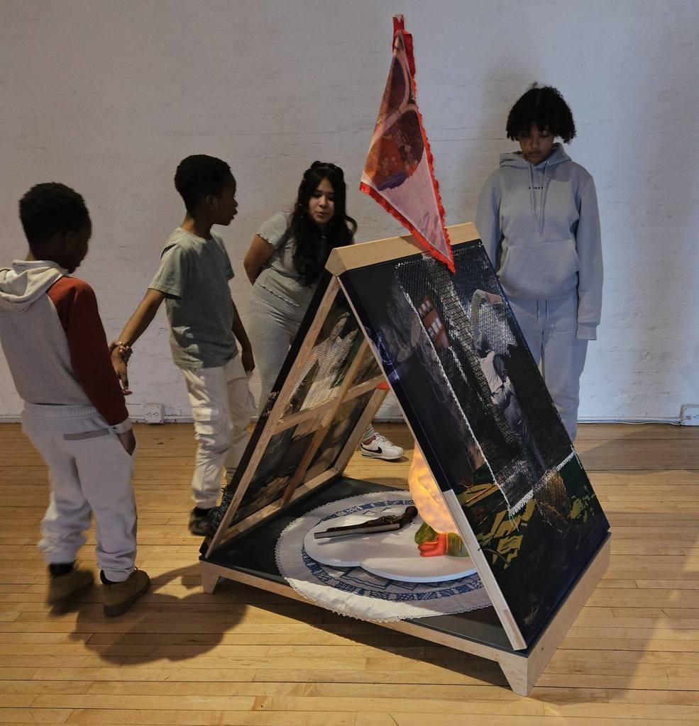 Students looking at artwork in the Erie Art Museum. 