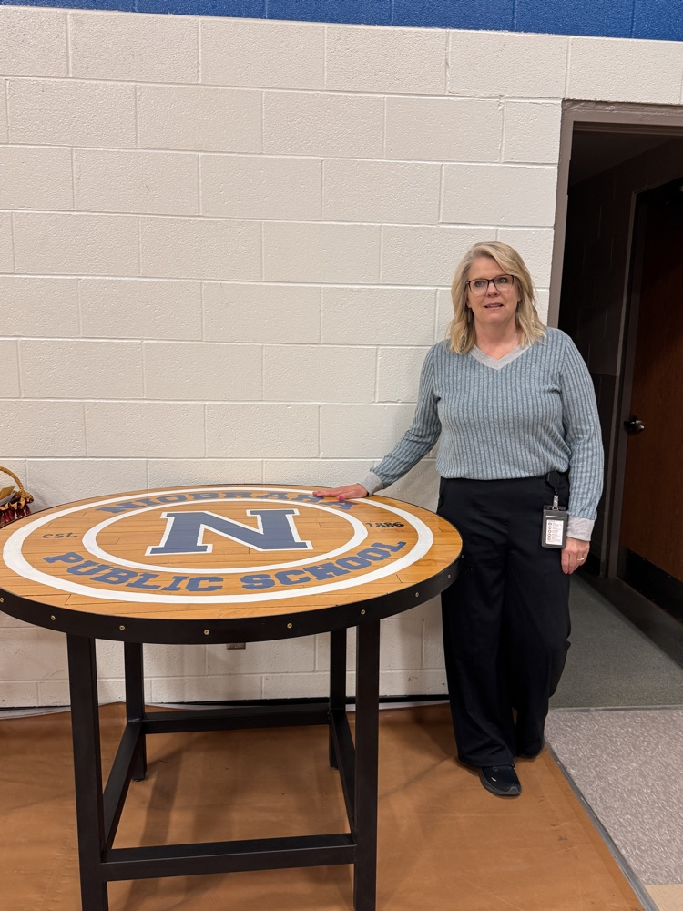 Mrs. Sandoz with table