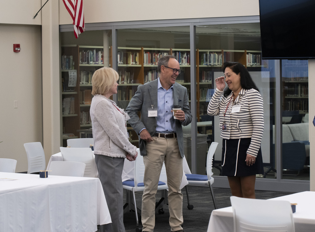 Superintendent Marc Bertrando laughs with guests.