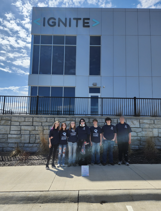 7 JAG students standing in front of the IGNITE pathways building