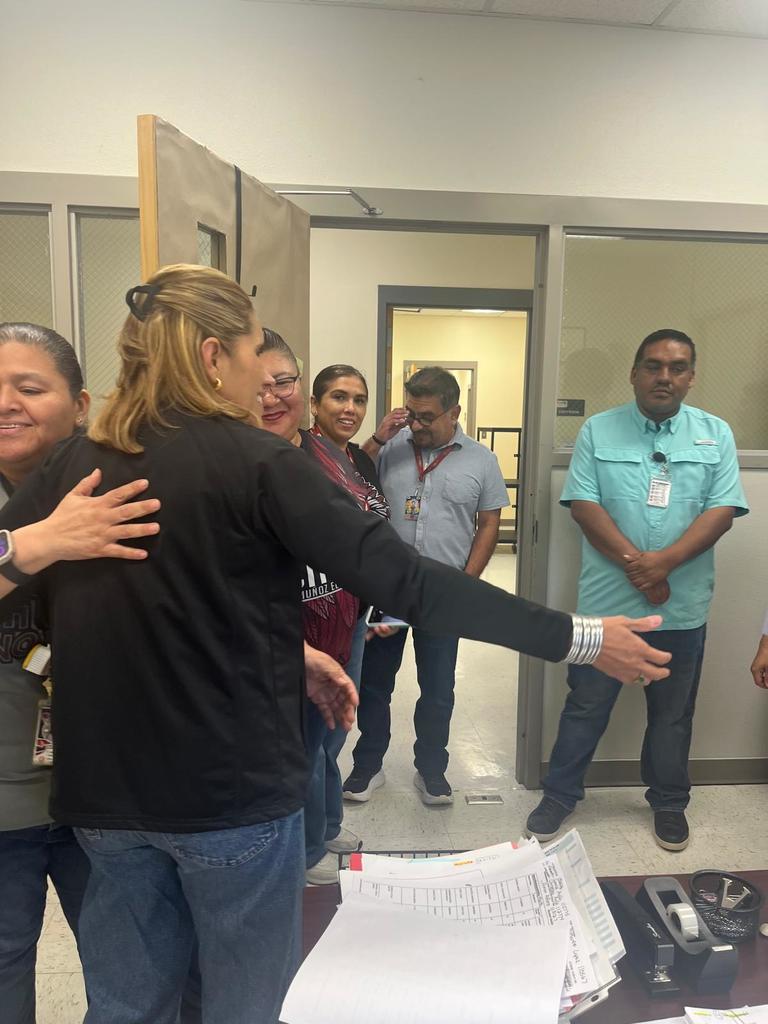 Teachers hug 