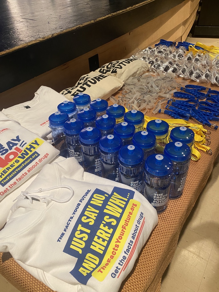 A table full of "swag" for the students at our The Facts. Your Future. presentation