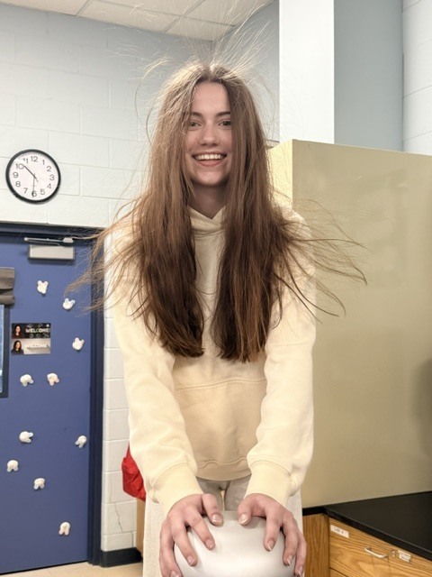 student with static electricity