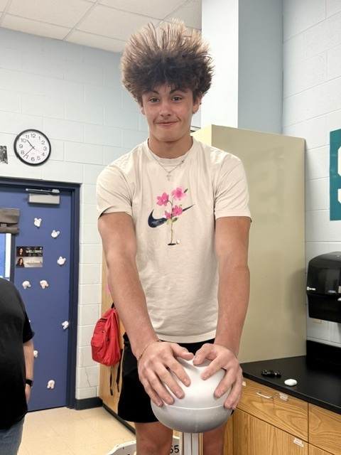 student with static electricity