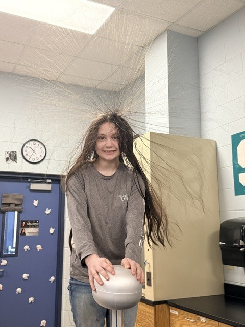 student with static electricity