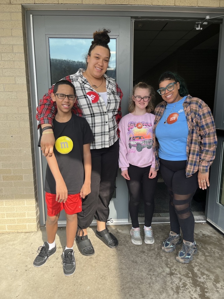 Students and staffed dressed as M&Ms