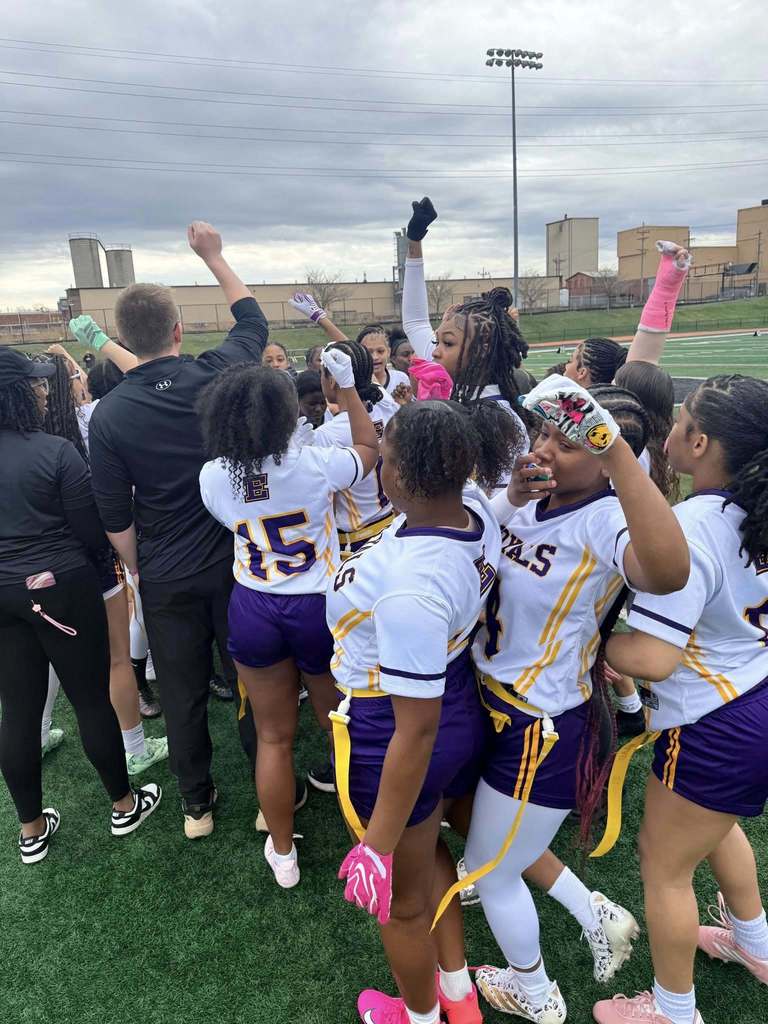Erie High Royals Girl Flag Football Team cheering. 