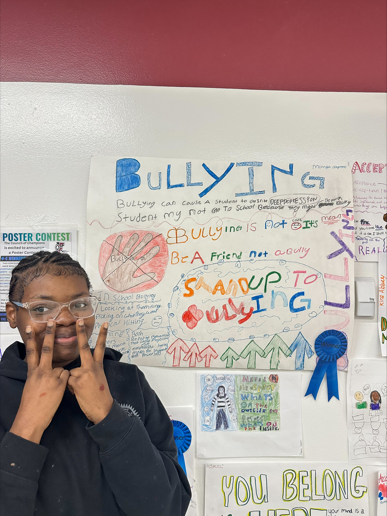 Student with her anti bullying poster