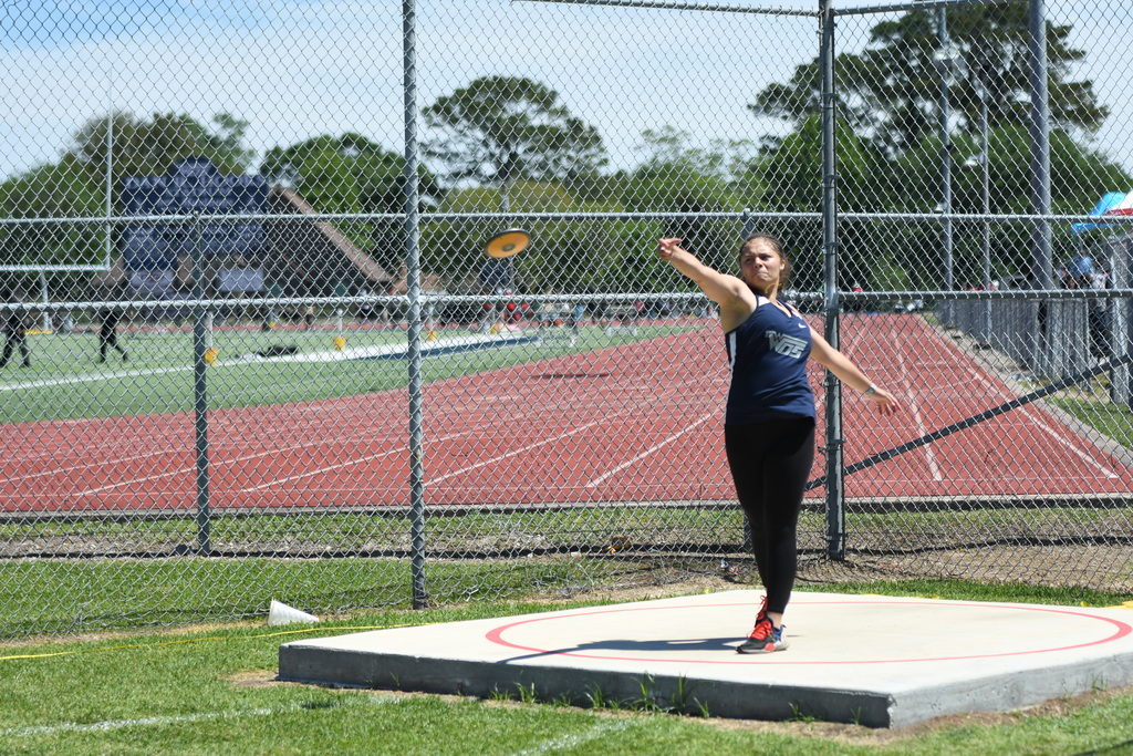 wos athlete throwing a discus