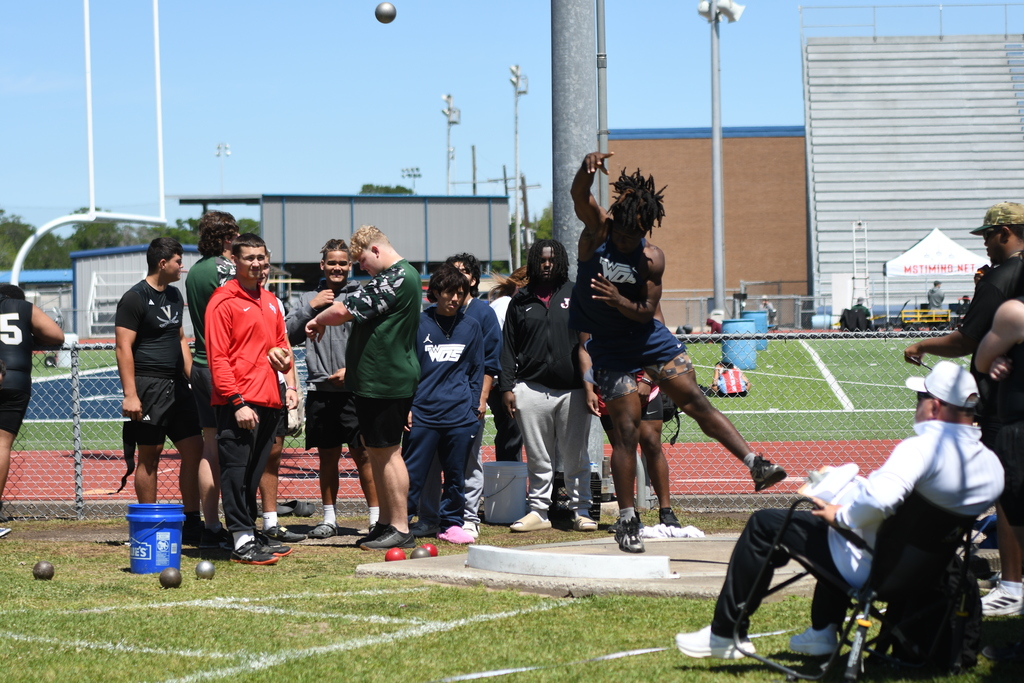 wos athlete throwing a shot put