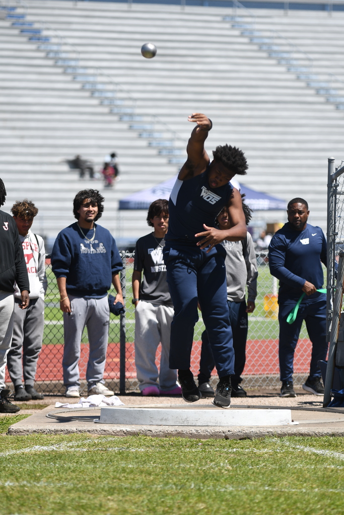 wos athlete throwing a shot put