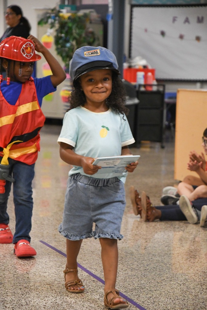 student dressed up as a mail worker