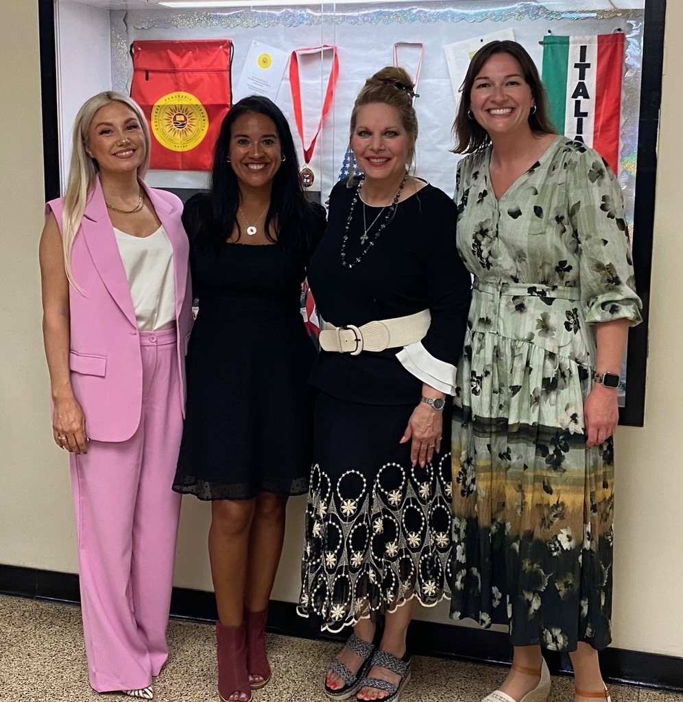 Spanish teachers Ms. Muntean, Mrs. Flood, Ms. Shonn, and Ms. Kridler
