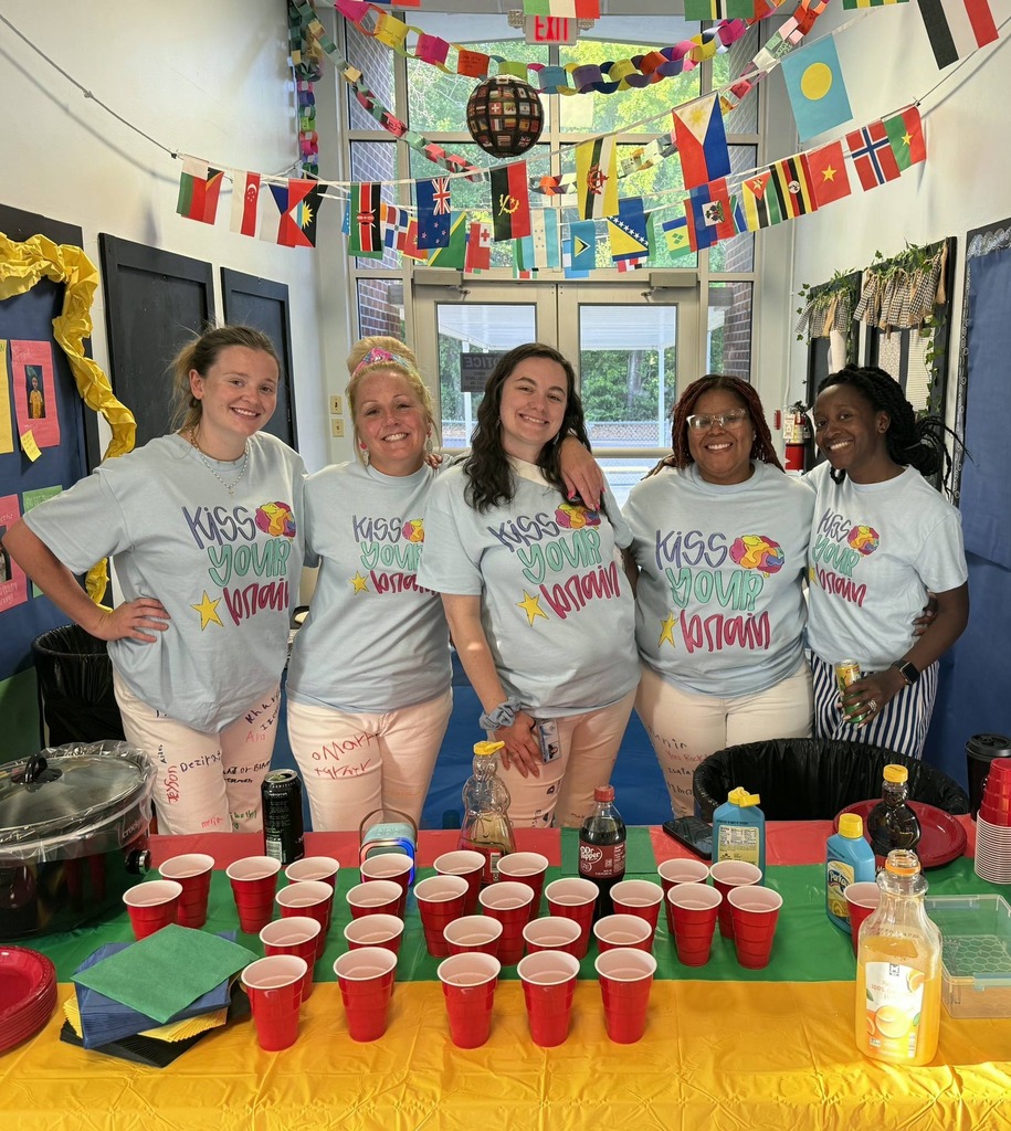 Ms. Newman, Ms. Danzey, Mrs. Ford, Mrs. Haynes-Jenkins, and Mrs. Thompson serving pancakes to the 3rd grade students before their test.