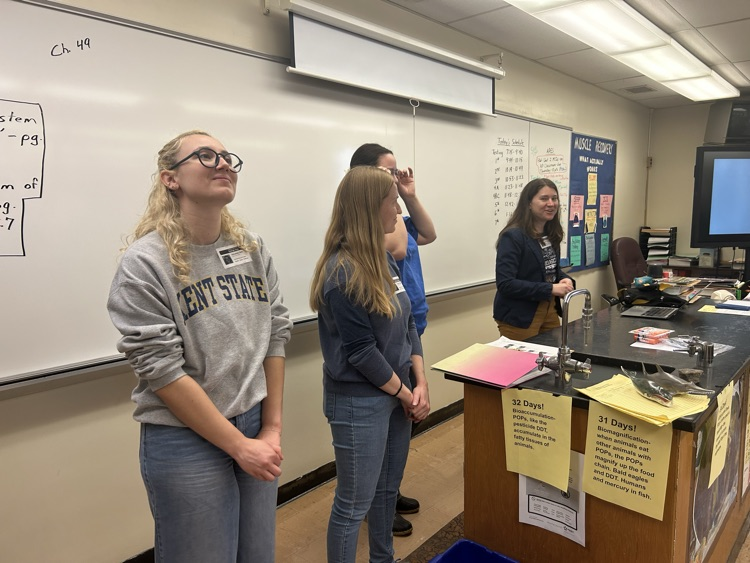 four Kent state scientist working on the wetlands monitoring program