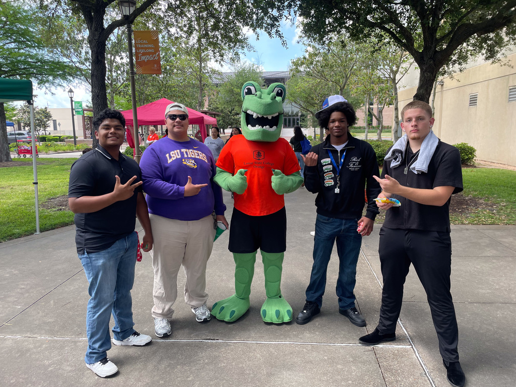 students standing around LSCO mascot