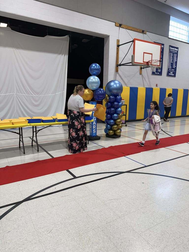 Students accepting their awards during the Awards assembly. 