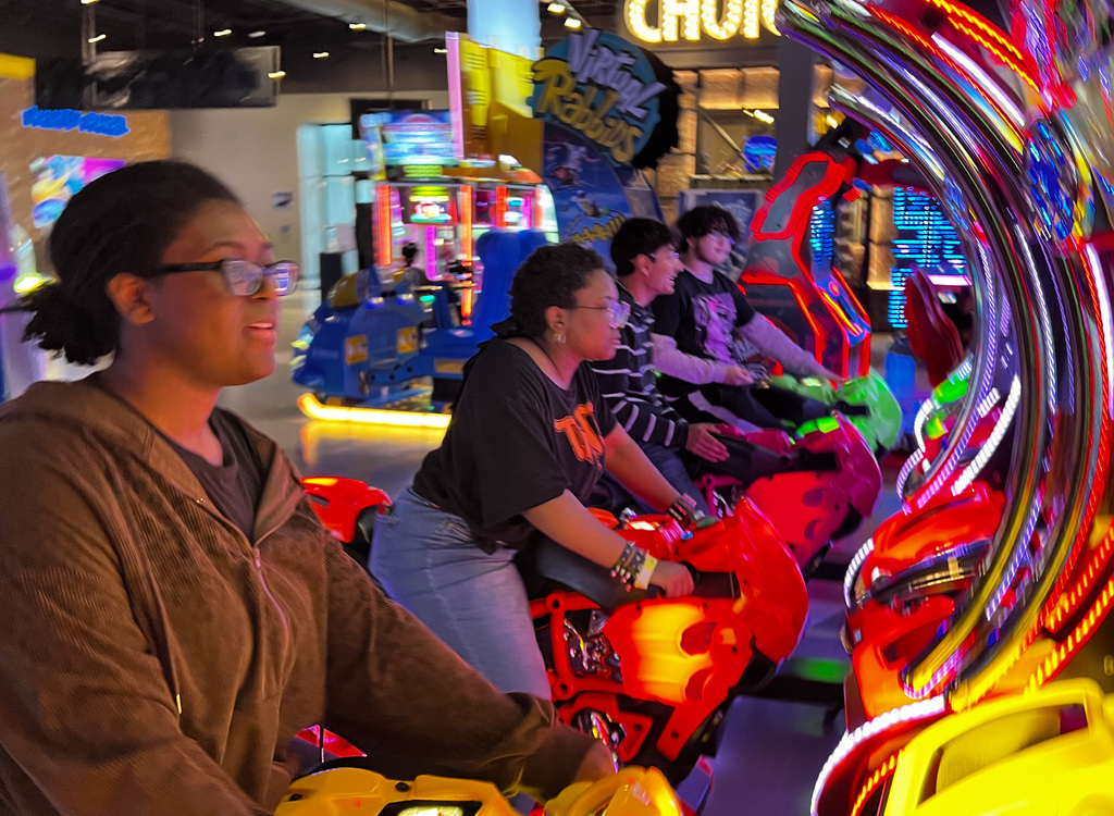 WOSHS student council members playing a racing game