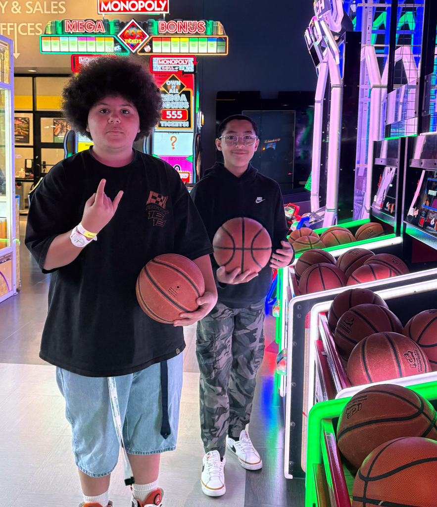 WOSHS student council members posing with basketballs
