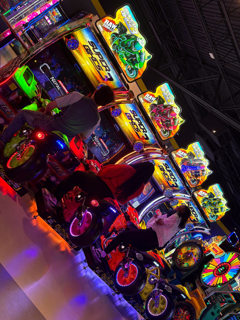 WOSHS student council playing arcade games at Main Event