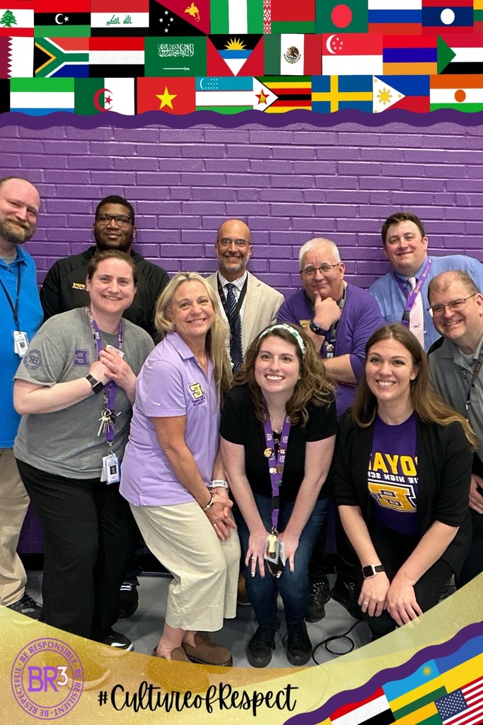 A group of people taking a photo with a boarder of different flags around the photo and on the bottom left it says #CultureofRespect.