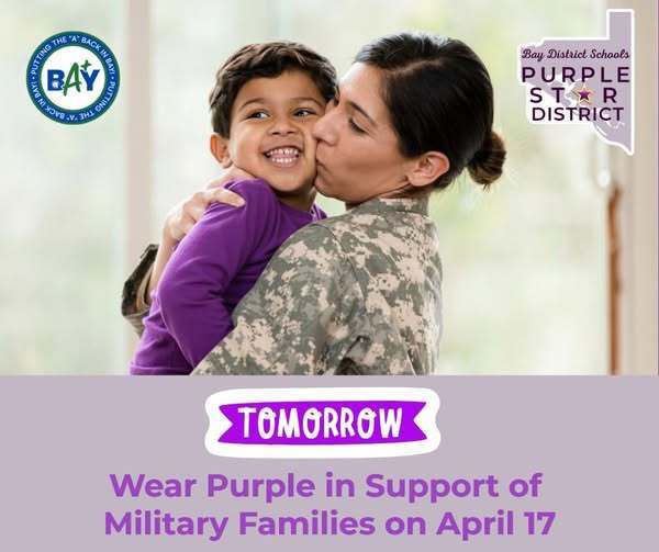Child in a purple shirt is hugged by an adult in military uniform. Text reads: “Tomorrow—Wear Purple in Support of Military Families on April 17.”