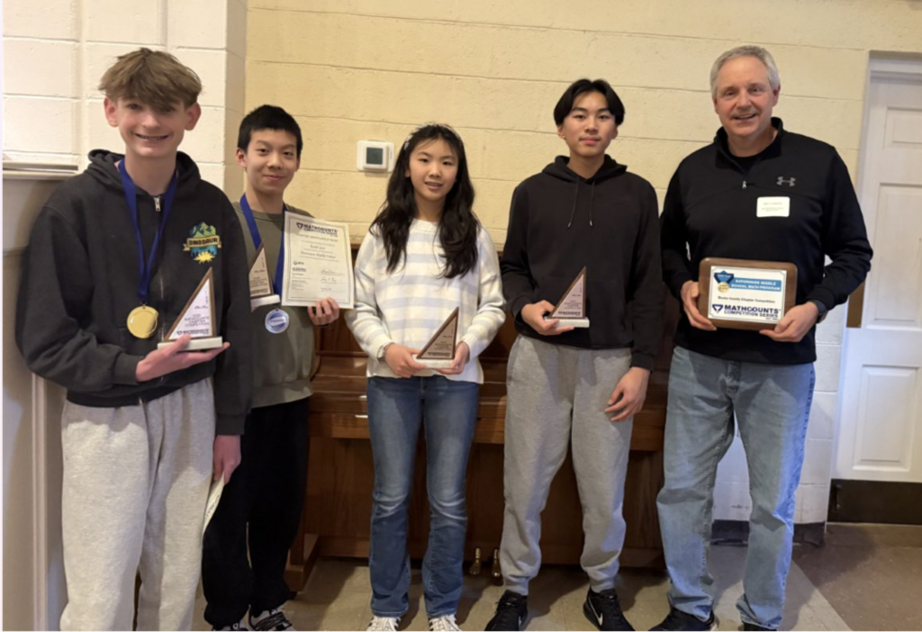 students receiving an award for math counts