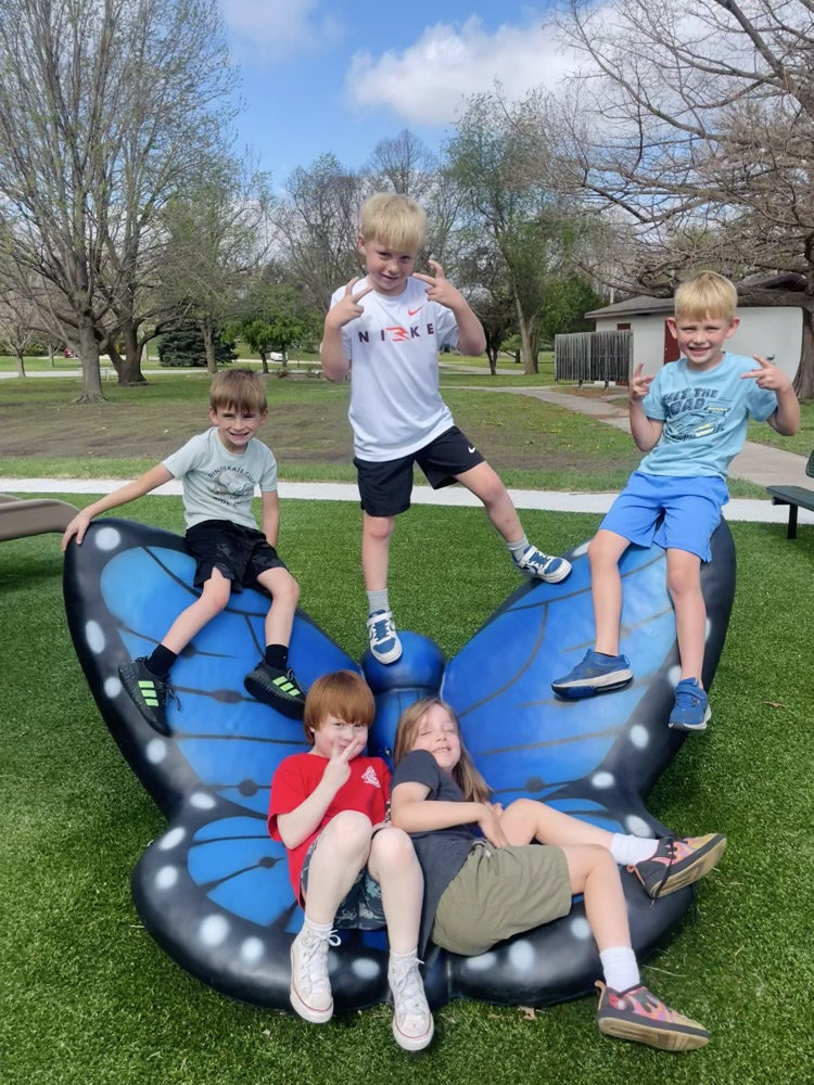 first graders playing at the park 