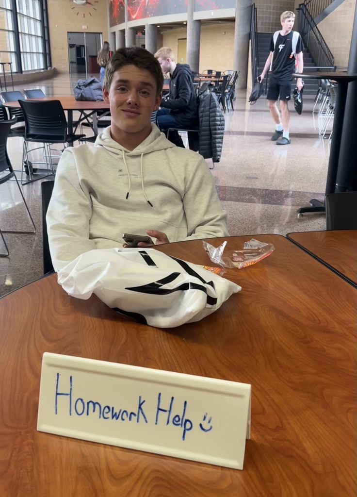 picture of student at homework help table