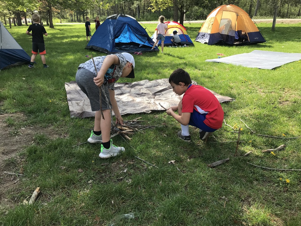 kids collecting wood