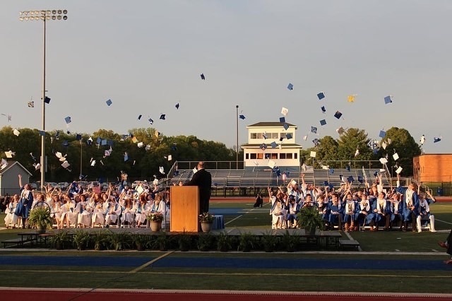 class of 2022 graduation - seniors throwing their caps
