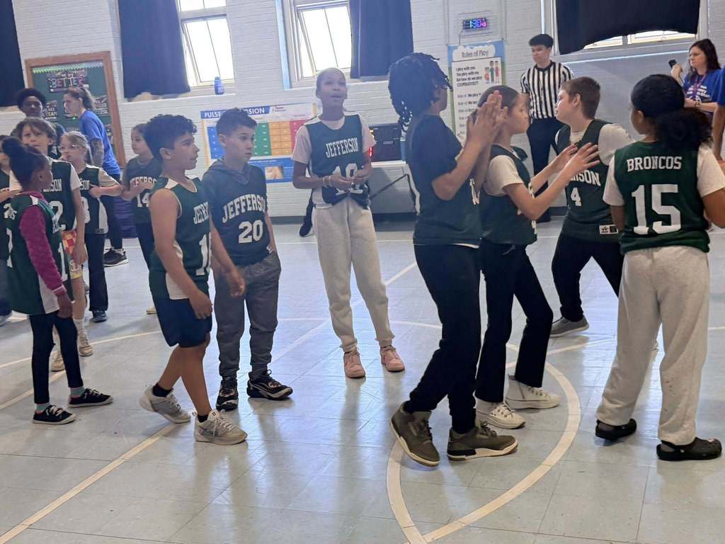 Students wearing Jefferson team jerseys. 