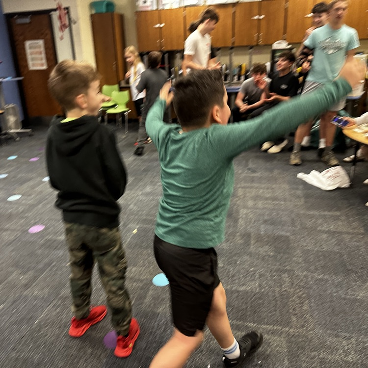 students participating in a fun fair game