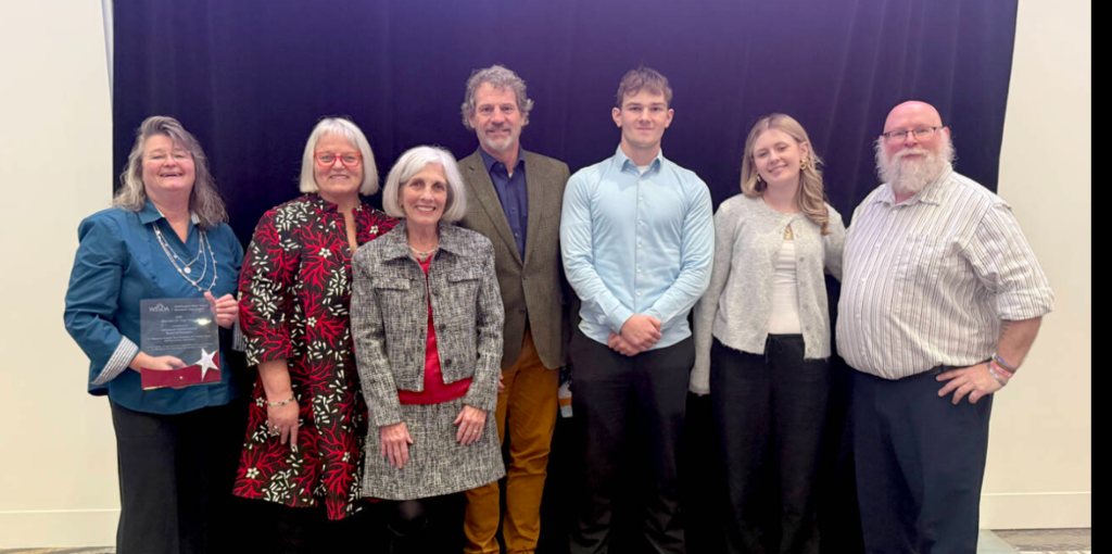 Board of Directors and the two Student Board Representatives posing for a picture together in 2025.