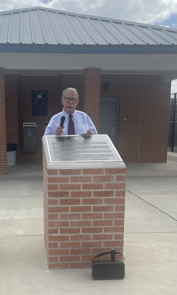 Coach Erich Grabowski speaking at dedication