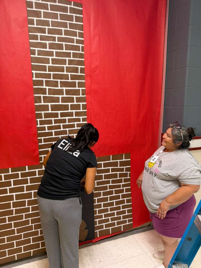 Women decorating fireplace
