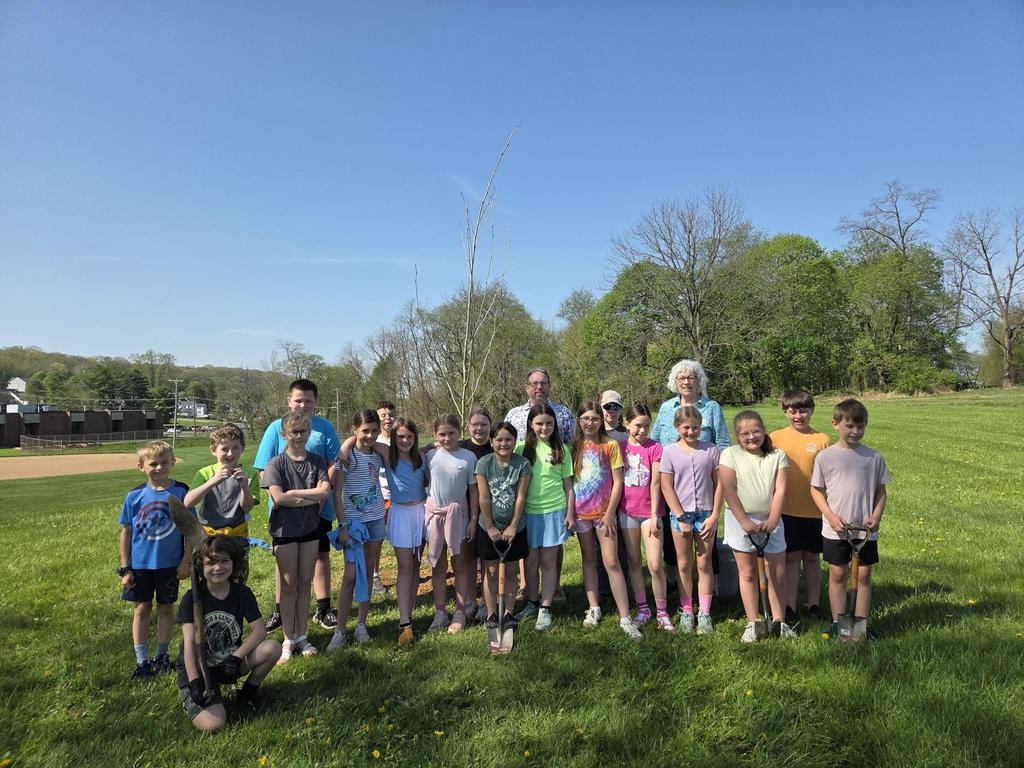 Delta Peach Bottom Elementary Garden Club posing with the tree they planted.