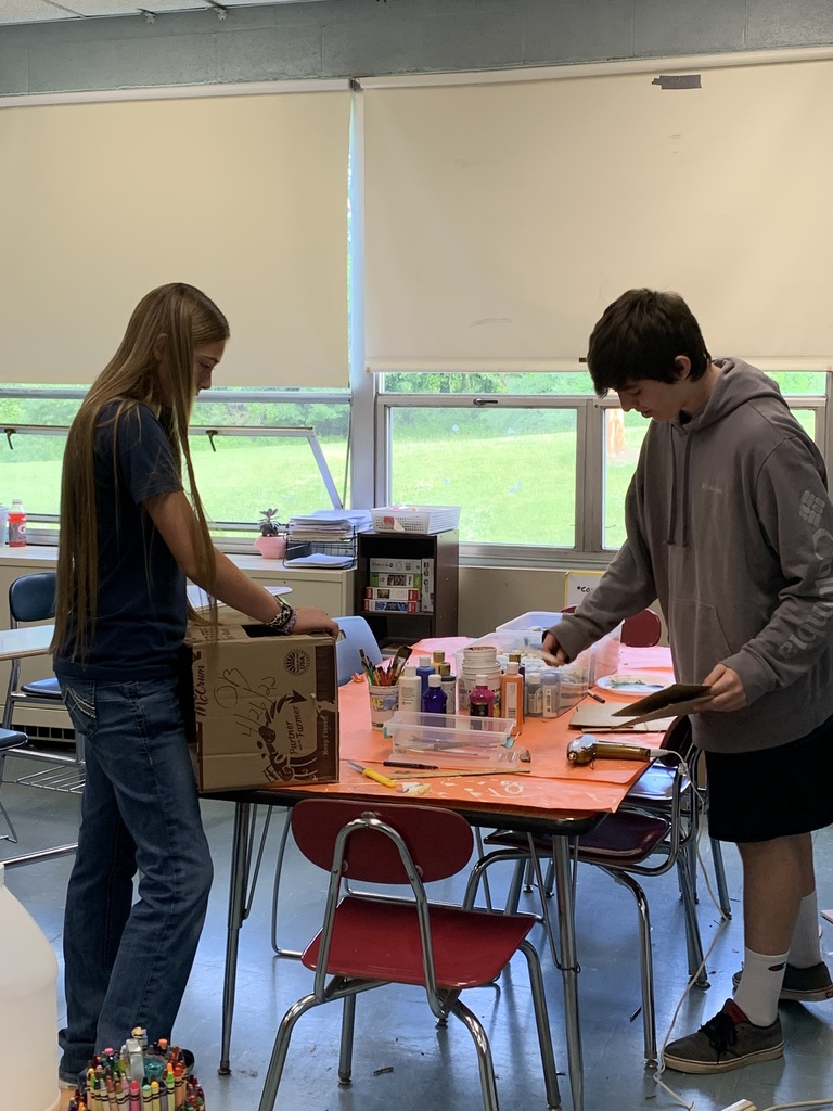 Kalie and Matt  working hard