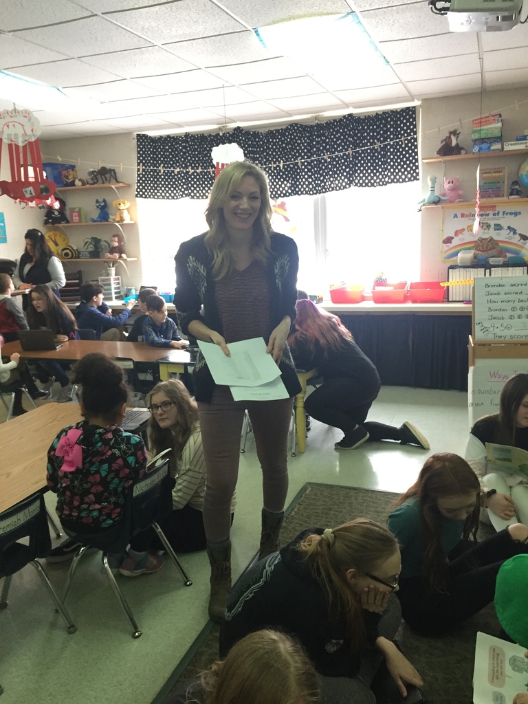 Mrs. Guiles leads the 8th Grade Buddy Project