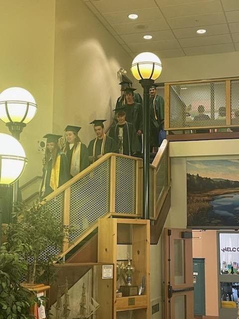 Seniors coming down the stairs