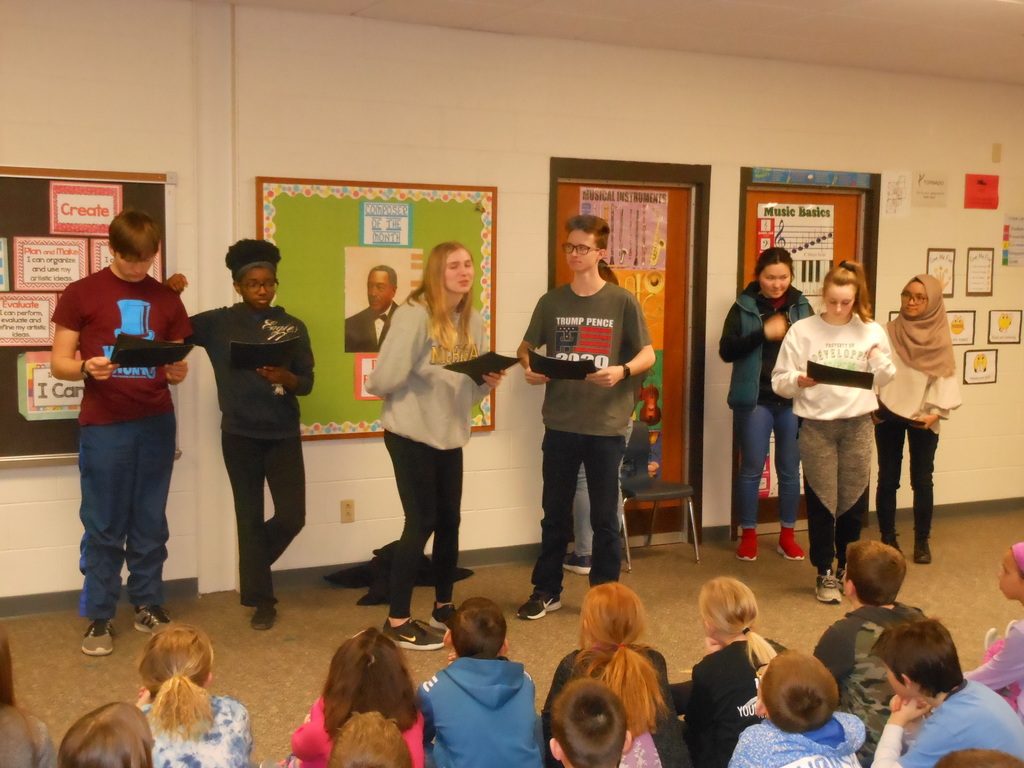 High school students demonstrate Reader's Theater to 4th graders at MP West