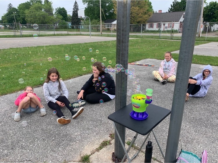 kids blowing bubbles