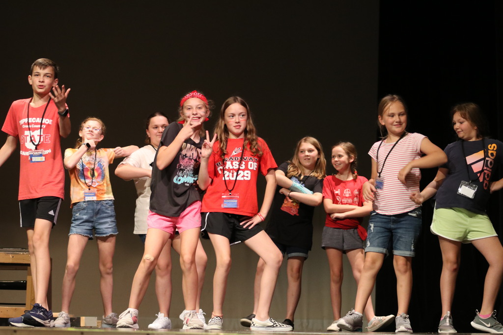 The cast of Beauty and the Beast, Jr. rehearse a scene.