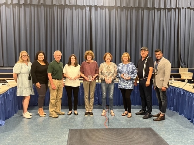 norwood school board awarding retirees