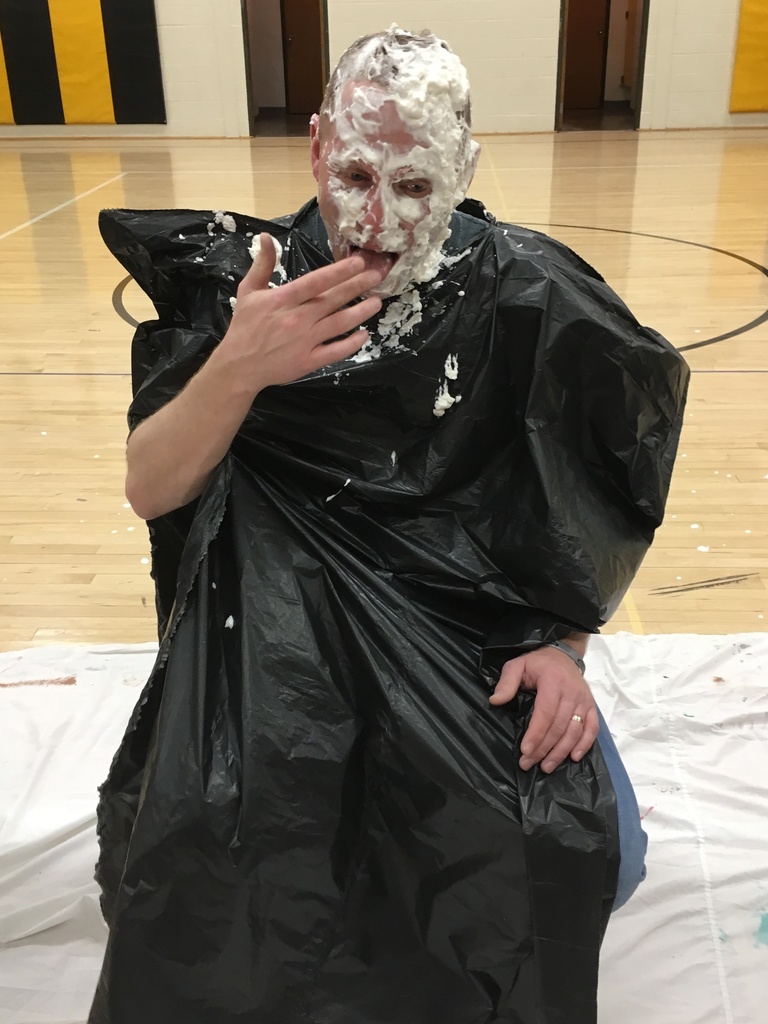 Principal Pennington tastes the pie in his face.