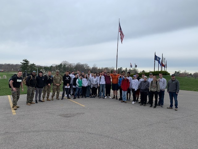 Air Force JROTC cadets pose for a picture after an event.