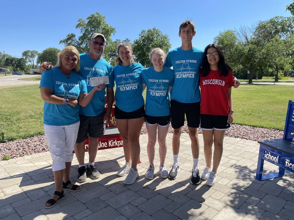 Colton family receiving check