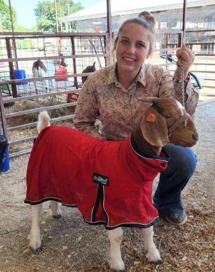 student with an animal 